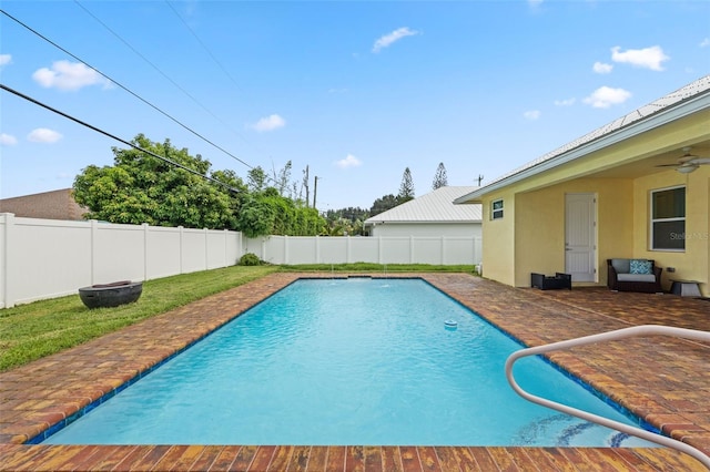 2912 SW Savona Blvd, Port St Lucie, FL 34953 - view of pool with a fenced backyard, a ceiling fan, and a patio