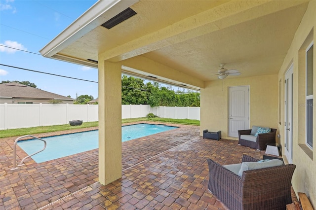 2912 SW Savona Blvd, Port St Lucie, FL 34953 - view of swimming pool featuring a fenced backyard, a patio, and ceiling fan