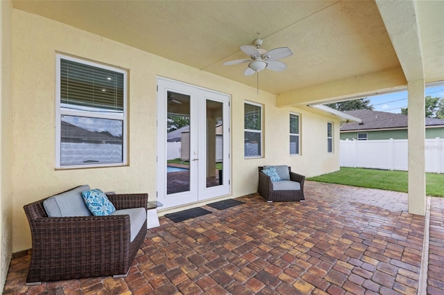 2912 SW Savona Blvd, Port St Lucie, FL 34953 - view of patio / terrace featuring french doors and ceiling fan