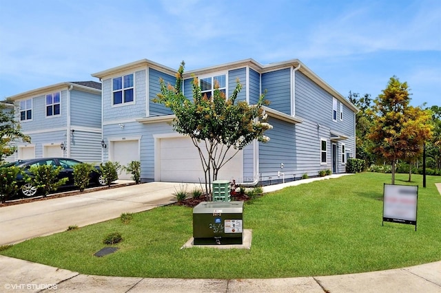 4501 Sparkling Shell Ave, Kissimmee, FL 34746 - view of front of home with a garage, driveway, and a front yard