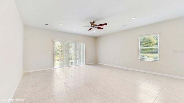 4501 Sparkling Shell Ave, Kissimmee, FL 34746 - empty room with a ceiling fan, light tile patterned floors, and recessed lighting