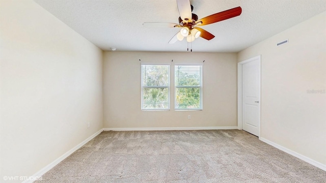 4501 Sparkling Shell Ave, Kissimmee, FL 34746 - empty room with a textured ceiling, a ceiling fan, and carpet floors