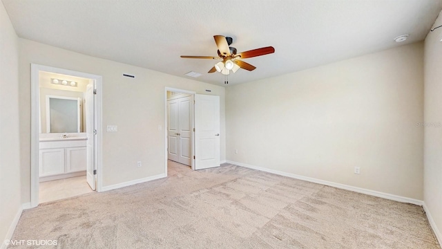 4501 Sparkling Shell Ave, Kissimmee, FL 34746 - unfurnished bedroom with carpet floors, ensuite bath, and a ceiling fan