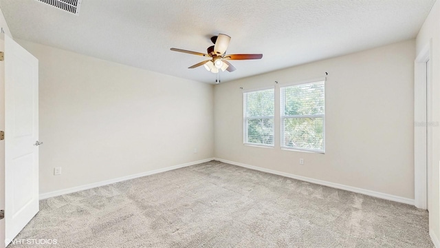 4501 Sparkling Shell Ave, Kissimmee, FL 34746 - empty room featuring a ceiling fan, carpet, and a textured ceiling