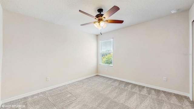 4501 Sparkling Shell Ave, Kissimmee, FL 34746 - unfurnished room featuring light colored carpet, a ceiling fan, and a smoke detector