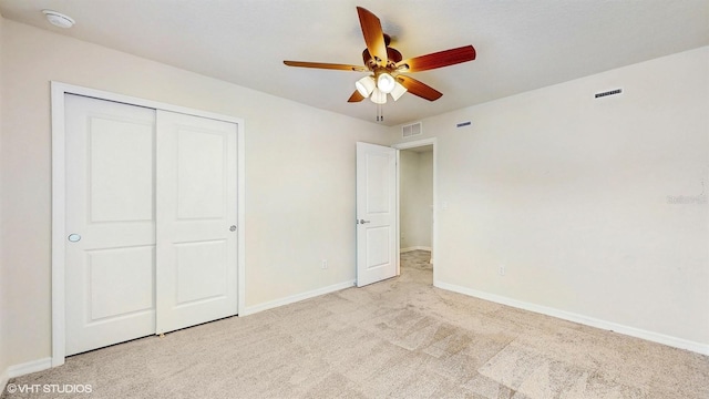 4501 Sparkling Shell Ave, Kissimmee, FL 34746 - unfurnished bedroom with carpet floors, a closet, and ceiling fan