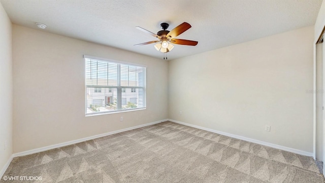 4501 Sparkling Shell Ave, Kissimmee, FL 34746 - spare room with light carpet, a smoke detector, and a ceiling fan