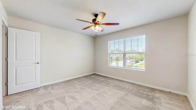4501 Sparkling Shell Ave, Kissimmee, FL 34746 - carpeted spare room with ceiling fan and baseboards