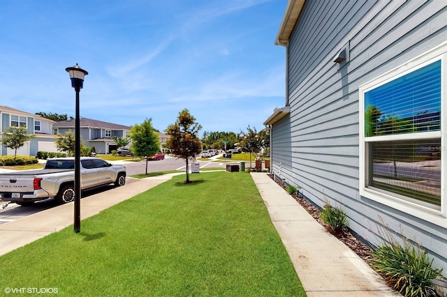 4501 Sparkling Shell Ave, Kissimmee, FL 34746 - view of grassy yard featuring a residential view