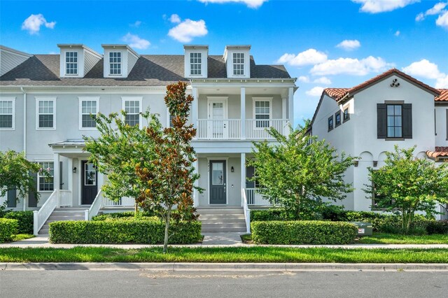 7412 Estuary Lake Loop, Celebration, FL 34747 - multi unit property with a balcony, stucco siding, and a porch