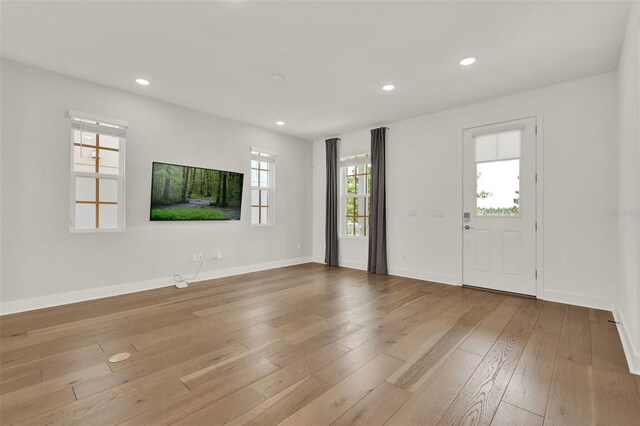 7412 Estuary Lake Loop, Celebration, FL 34747 - entryway with wood-type flooring and recessed lighting
