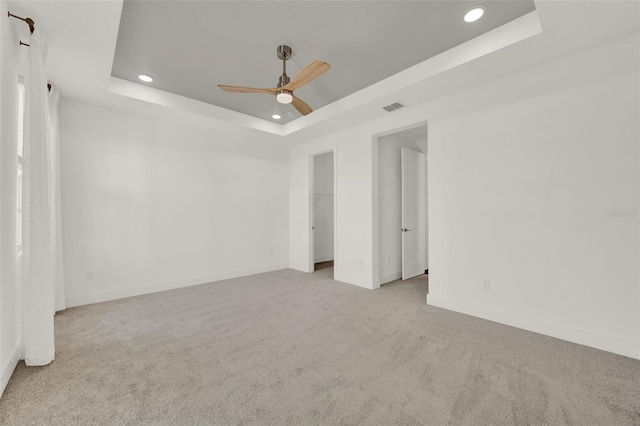 7412 Estuary Lake Loop, Celebration, FL 34747 - spare room featuring a raised ceiling, carpet floors, recessed lighting, and ceiling fan