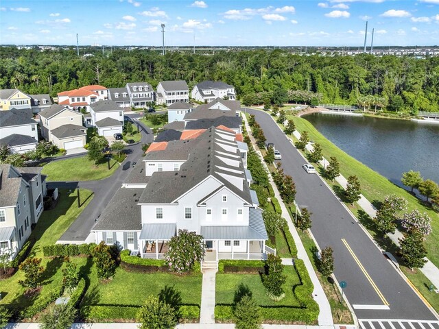7412 Estuary Lake Loop, Celebration, FL 34747 - aerial perspective of suburban area with a nearby body of water
