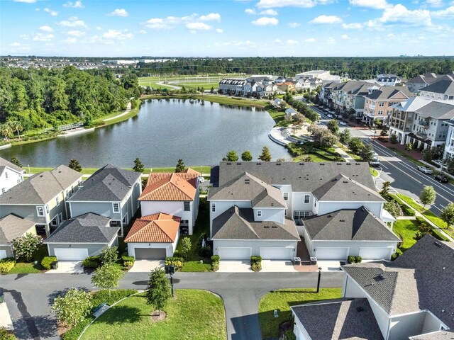 7412 Estuary Lake Loop, Celebration, FL 34747 - aerial view of residential area with a large body of water