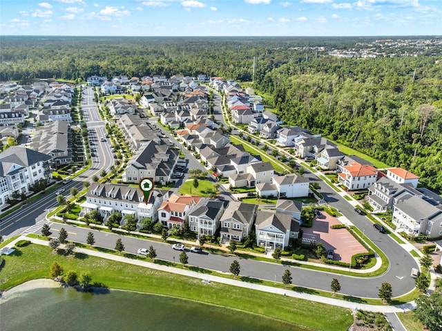 7412 Estuary Lake Loop, Celebration, FL 34747 - aerial view of residential area featuring a heavily wooded area