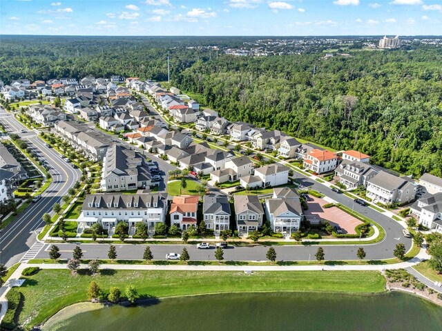 7412 Estuary Lake Loop, Celebration, FL 34747 - aerial overview of property's location with nearby suburban area and a nearby body of water