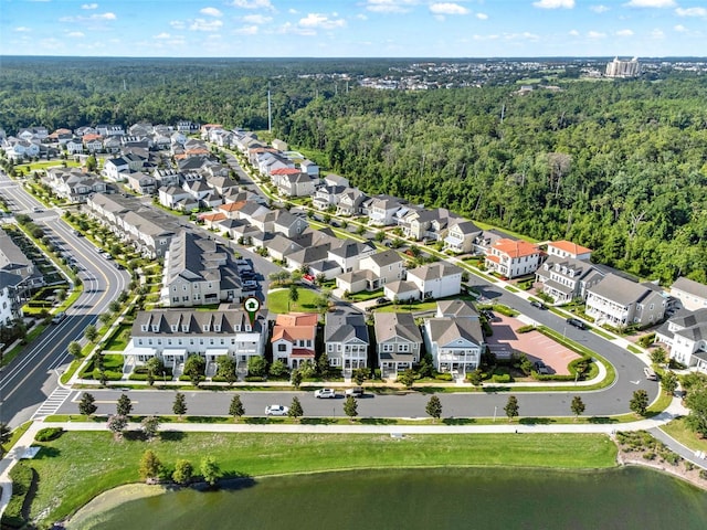 7412 Estuary Lake Loop, Celebration, FL 34747 - aerial view of property's location with nearby suburban area and a large body of water