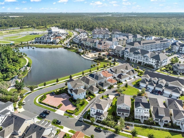 7412 Estuary Lake Loop, Celebration, FL 34747 - aerial view of property's location featuring a forest and a nearby body of water