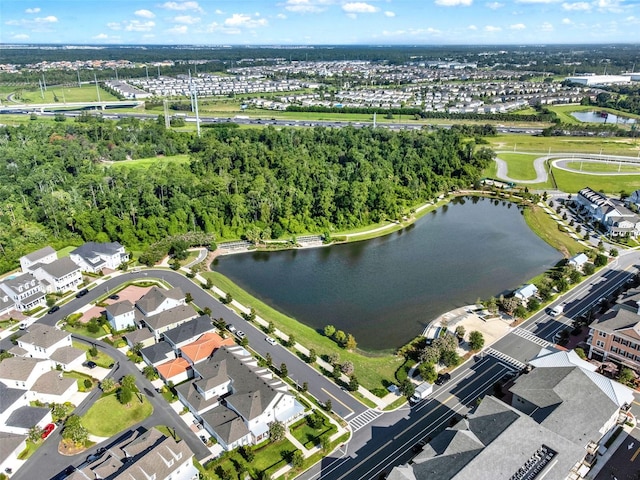 7412 Estuary Lake Loop, Celebration, FL 34747 - aerial overview of property's location featuring a large body of water and nearby suburban area