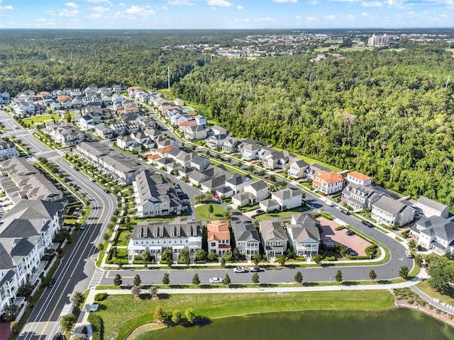 7412 Estuary Lake Loop, Celebration, FL 34747 - aerial view of property and surrounding area with nearby suburban area and a nearby body of water
