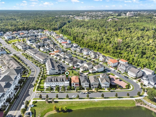 7412 Estuary Lake Loop, Celebration, FL 34747 - aerial overview of property's location with nearby suburban area and a large body of water