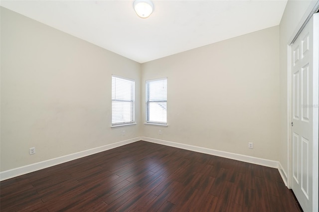 9379 Royal Estates Blvd, Orlando, FL 32836 - unfurnished bedroom featuring baseboards and dark wood finished floors