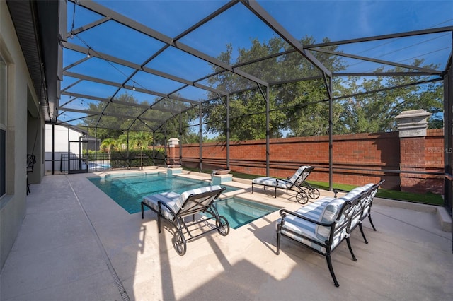 9379 Royal Estates Blvd, Orlando, FL 32836 - view of pool featuring a patio area, an in-ground hot tub, a fenced backyard, and glass enclosure