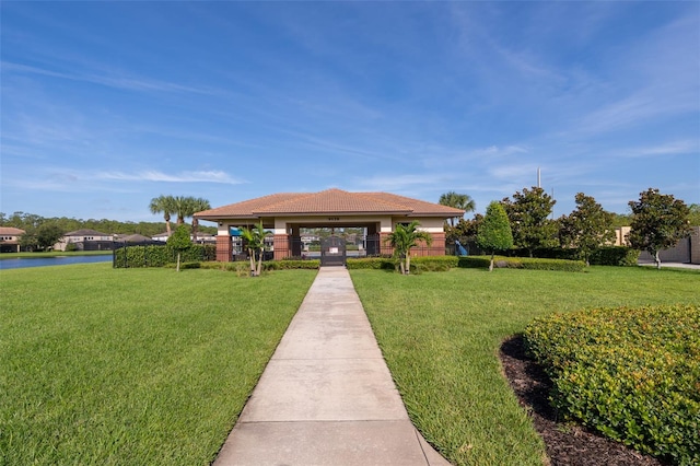 9379 Royal Estates Blvd, Orlando, FL 32836 - view of property's community with a lawn and a water view