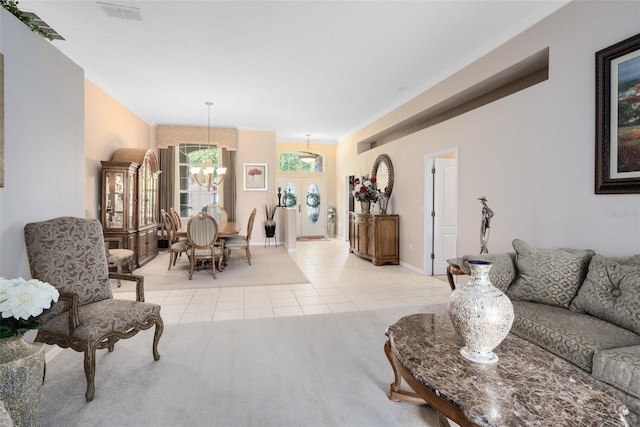 1331 Marble Crest Way, Winter Garden, FL 34787 - living room with a chandelier, light tile patterned floors, and light carpet