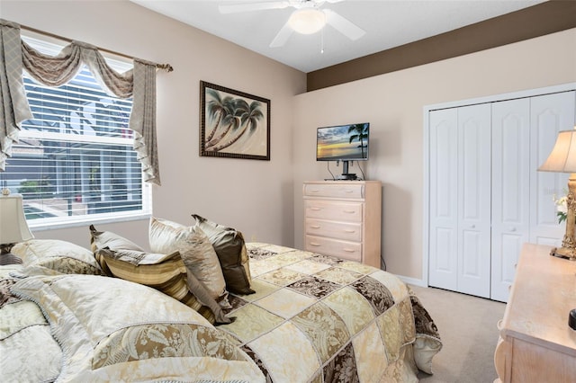 1331 Marble Crest Way, Winter Garden, FL 34787 - bedroom with light colored carpet, a closet, multiple windows, and a ceiling fan