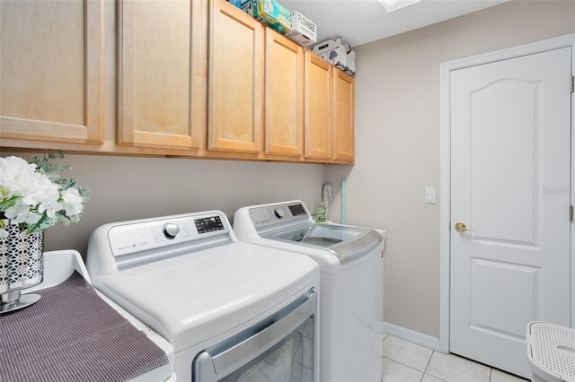 1331 Marble Crest Way, Winter Garden, FL 34787 - laundry area with independent washer and dryer, cabinet space, and light tile patterned floors