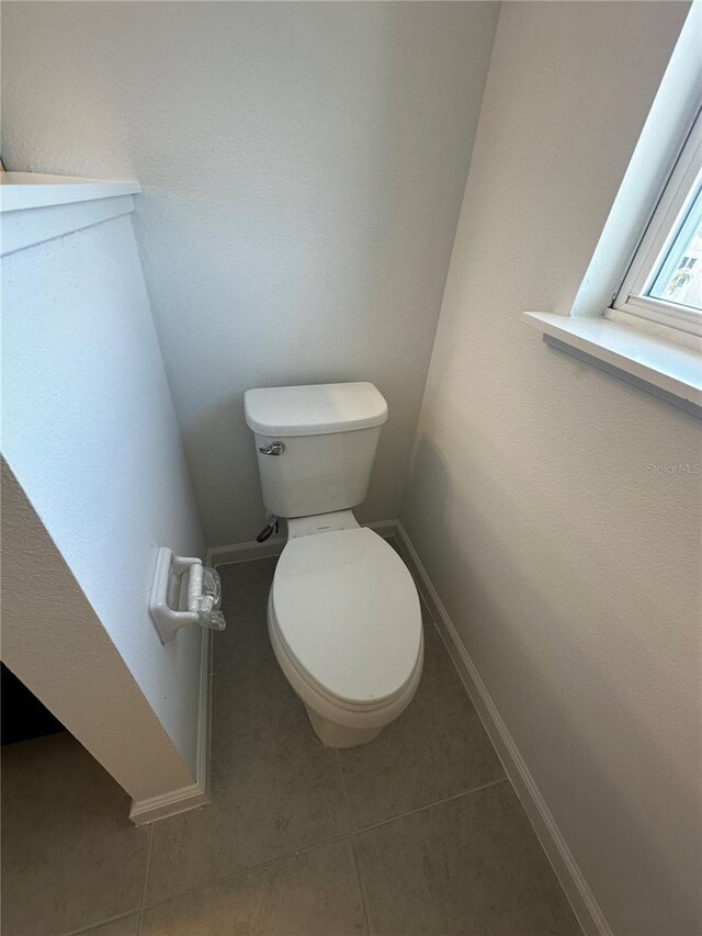 14099 Lochend Way, Winter Garden, FL 34787 - bathroom featuring toilet and tile patterned floors