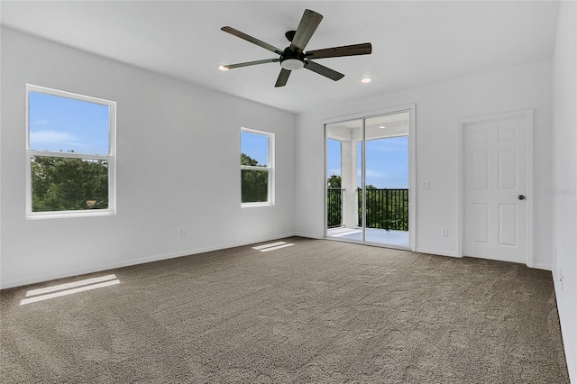17458 Chateau Pine Way, Clermont, FL 34711 - empty room with carpet floors, ceiling fan, and recessed lighting