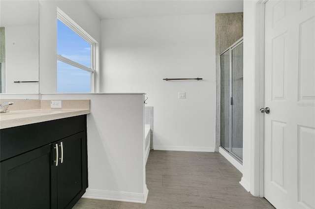 17458 Chateau Pine Way, Clermont, FL 34711 - full bath with vanity, a stall shower, and a garden tub
