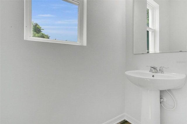 17458 Chateau Pine Way, Clermont, FL 34711 - bathroom featuring plenty of natural light