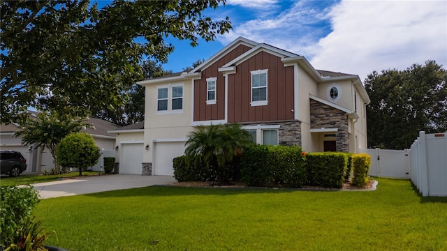 4024 Blazewater Ct, Eustis, FL 32736 - view of front of property with board and batten siding, concrete driveway, stone siding, an attached garage, and a gate
