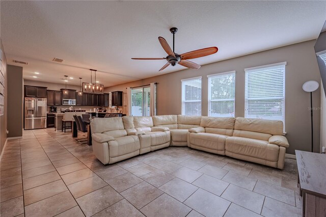 4024 Blazewater Ct, Eustis, FL 32736 - living area featuring ceiling fan and light tile patterned floors