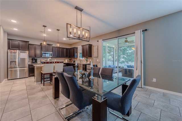 4024 Blazewater Ct, Eustis, FL 32736 - dining area with a chandelier, recessed lighting, and light tile patterned floors