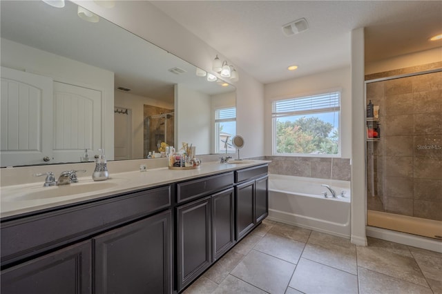 4024 Blazewater Ct, Eustis, FL 32736 - bathroom with a shower stall, double vanity, a bath, and tile patterned floors
