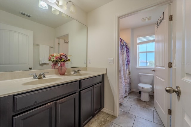 4024 Blazewater Ct, Eustis, FL 32736 - full bathroom with double vanity and tile patterned floors