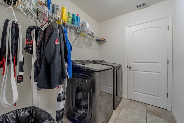 4024 Blazewater Ct, Eustis, FL 32736 - laundry room with washer and dryer and baseboards