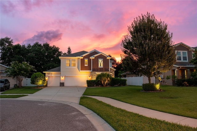 4024 Blazewater Ct, Eustis, FL 32736 - traditional-style house with stone siding, driveway, and a garage