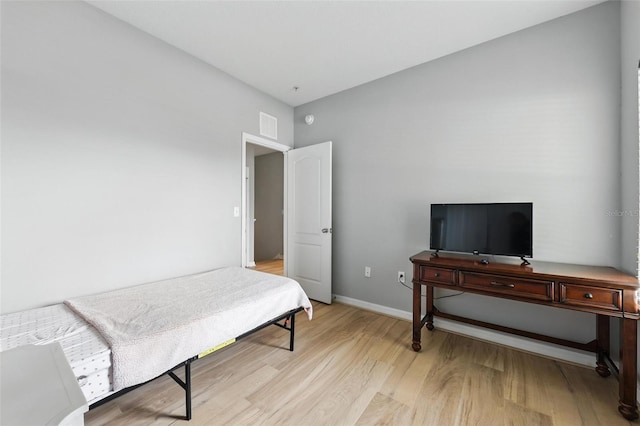 1551 Scarlet Oak Loop Unit B, Winter Garden, FL 34787 - bedroom with light wood finished floors and baseboards