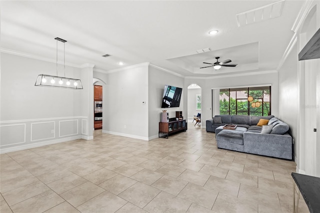 32619 View Haven Ln, Sorrento, FL 32776 - living area with arched walkways, a ceiling fan, ornamental molding, recessed lighting, and a raised ceiling