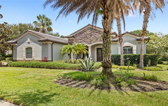 32619 View Haven Ln, Sorrento, FL 32776 - view of front of house with stucco siding and a front lawn