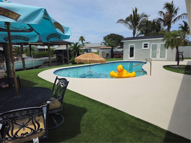 142 Reef Rd, South Daytona, FL 32119 - view of pool with french doors and a patio area