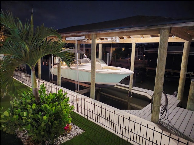 142 Reef Rd, South Daytona, FL 32119 - dock featuring boat lift