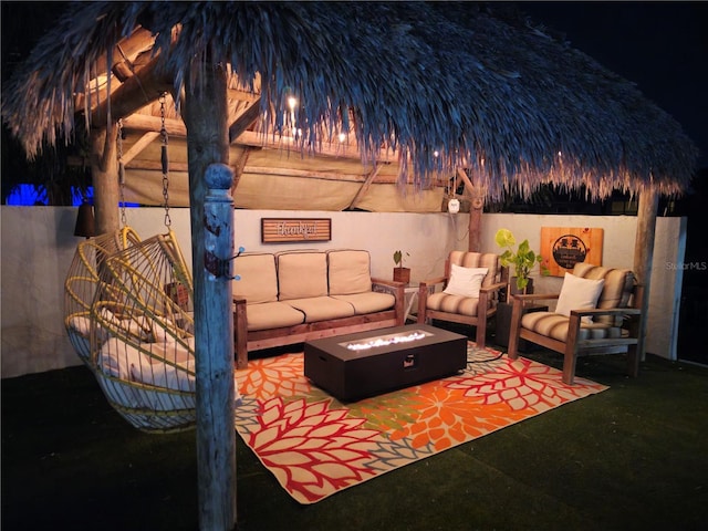 142 Reef Rd, South Daytona, FL 32119 - view of patio with an outdoor living space with a fire pit