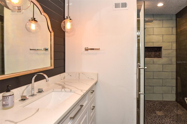 142 Reef Rd, South Daytona, FL 32119 - full bathroom with vanity, a stall shower, and recessed lighting