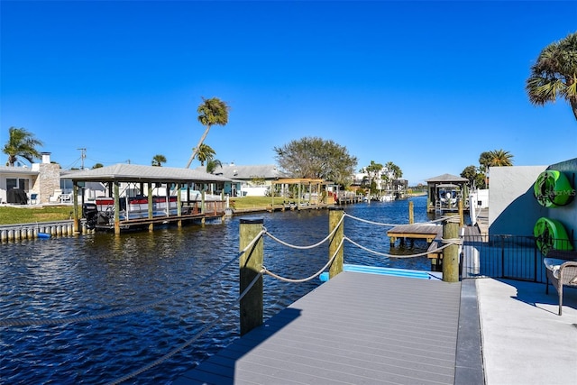 142 Reef Rd, South Daytona, FL 32119 - dock area featuring a water view and boat lift